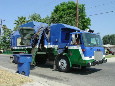 Staff at work for business waste removal in Raynes Park, emphasising ethical operations